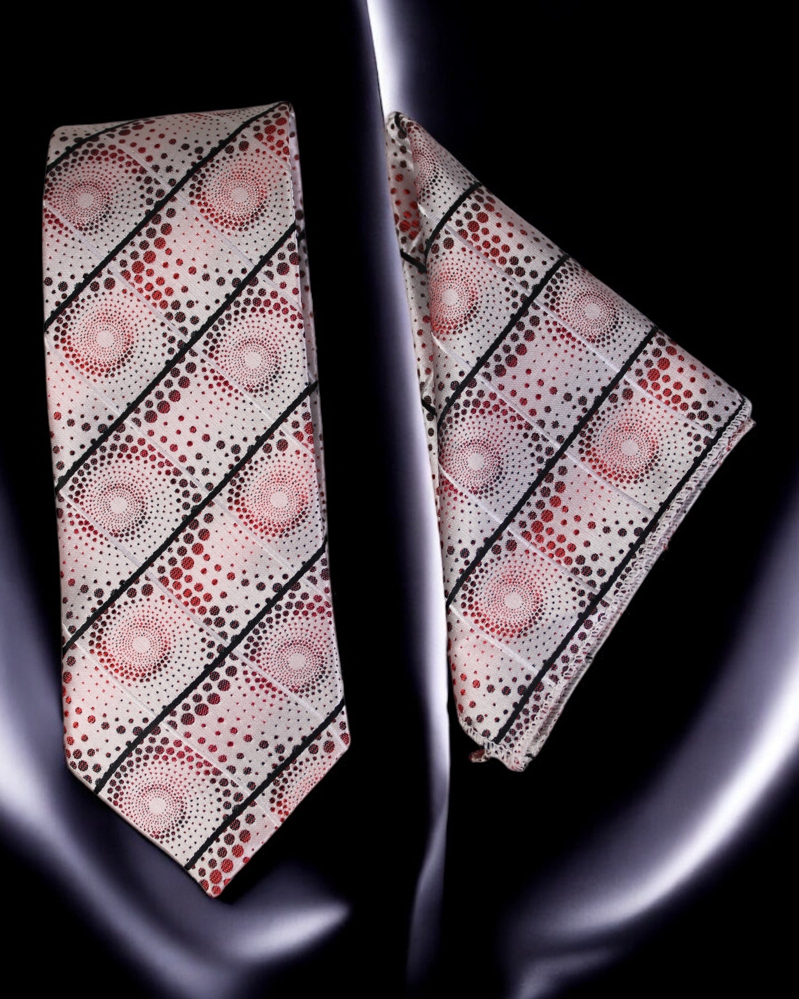 Patterned tie and pocket square set on a dark background Tie Benon
