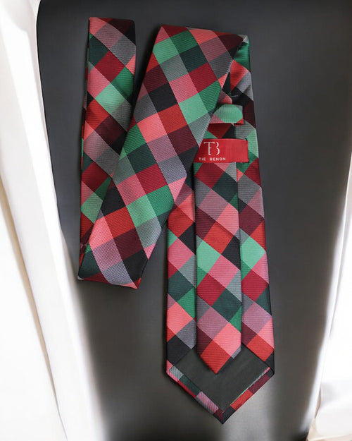 Plaid tie with a red label on a dark surface Tie Benon