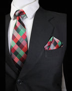 Black suit with a plaid tie and pocket square on a black background Tie Benon