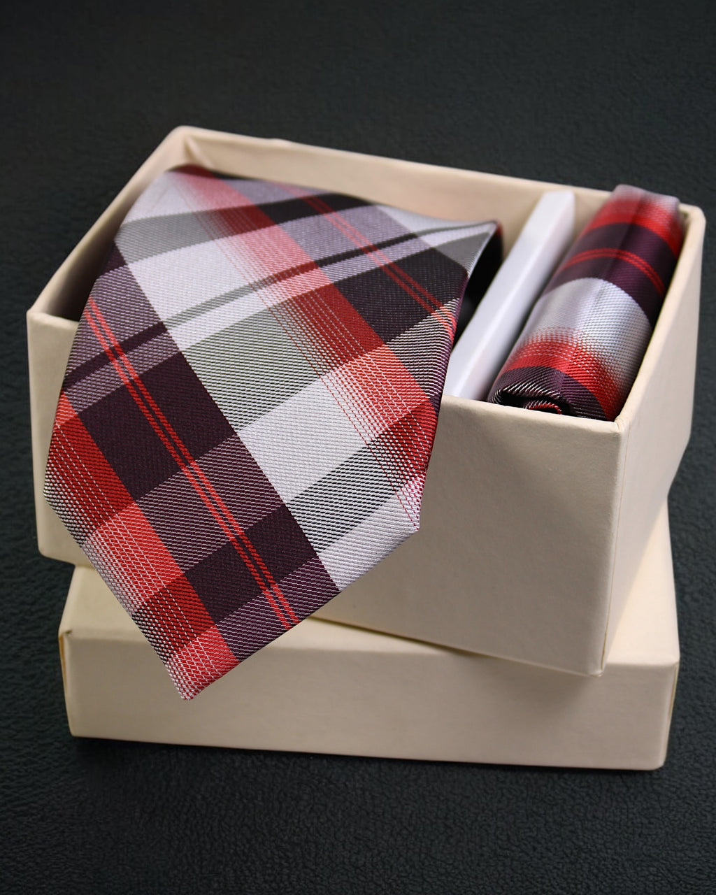 Plaid tie and pocket square set in a box on a dark background Tie Benon