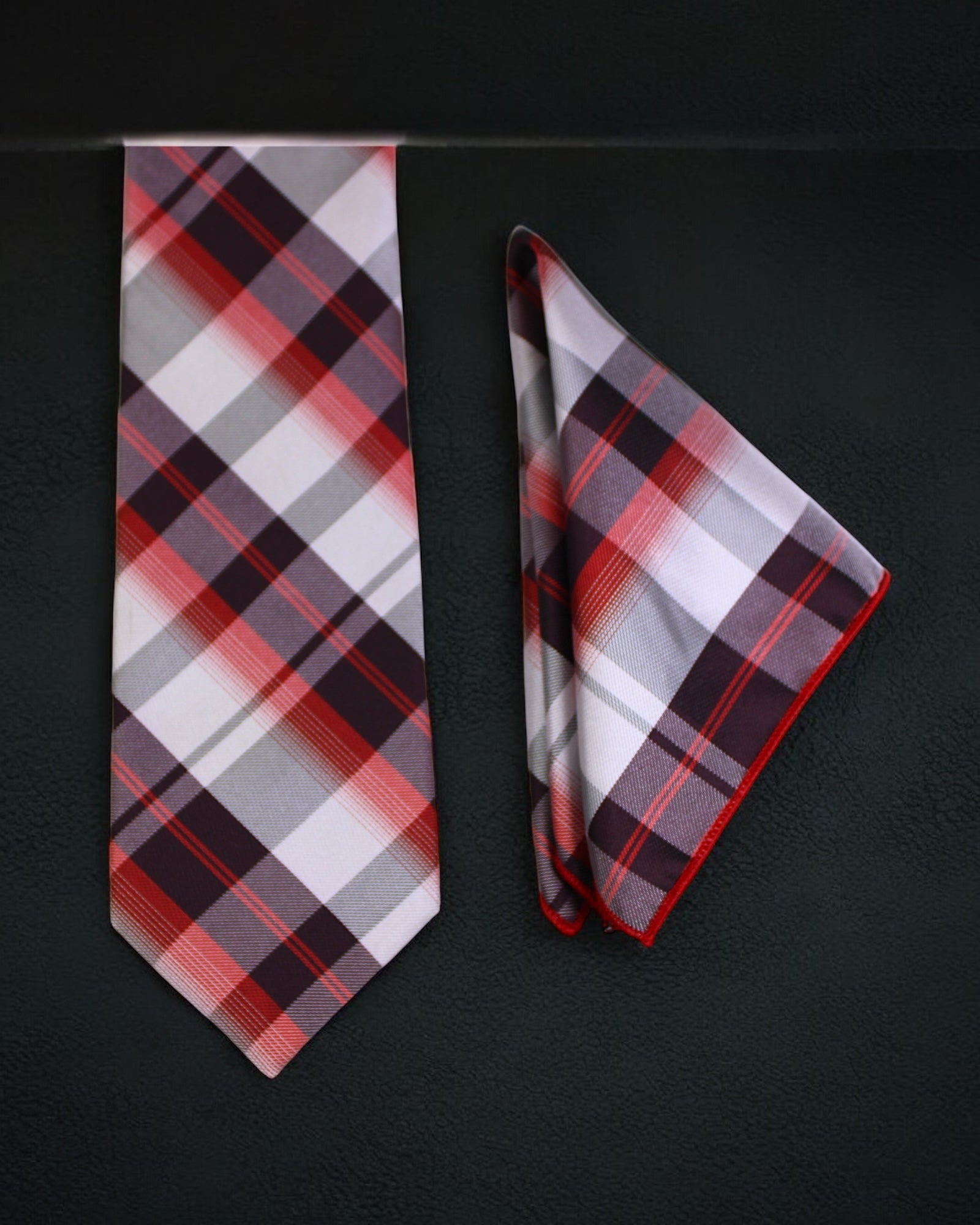Plaid tie and pocket square set on a black background Tie Benon