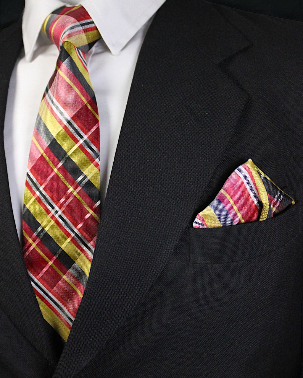 Black suit with a colorful plaid tie and pocket square Tie Benon