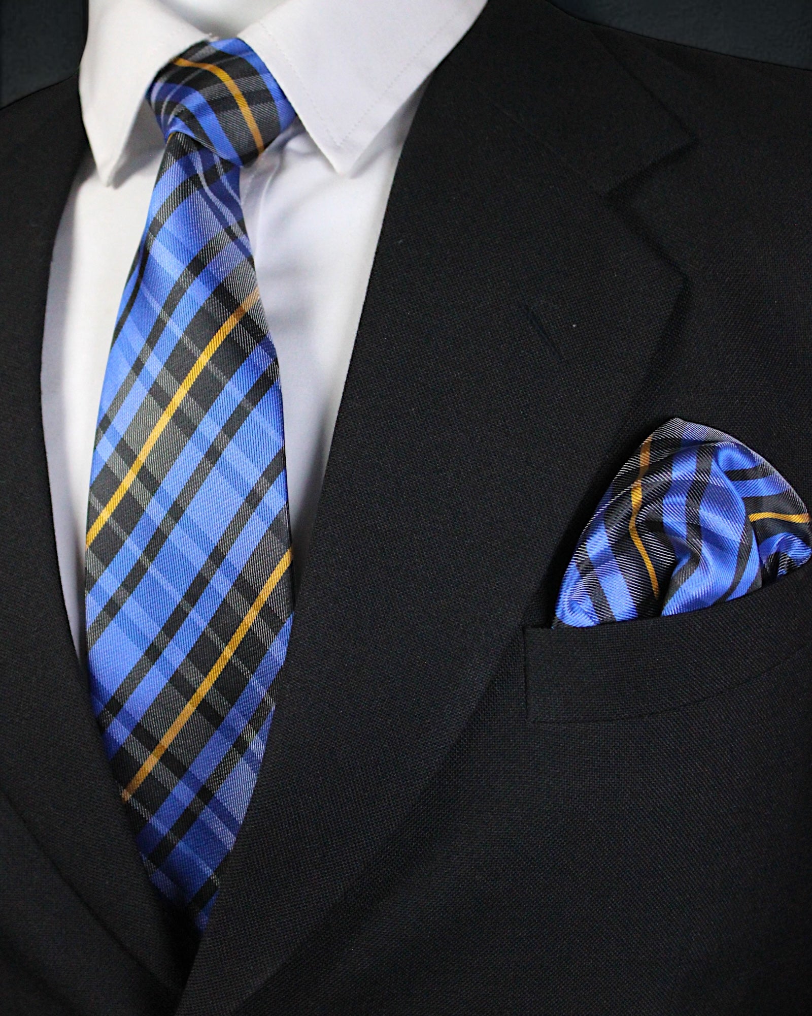 Black suit with blue plaid tie and pocket square Tie Benon