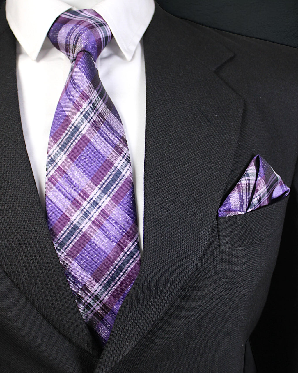 Black suit with a purple plaid tie and matching pocket square Tie Benon