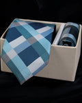 Blue checkered tie and pocket square set in a box on a black background tie  Benon