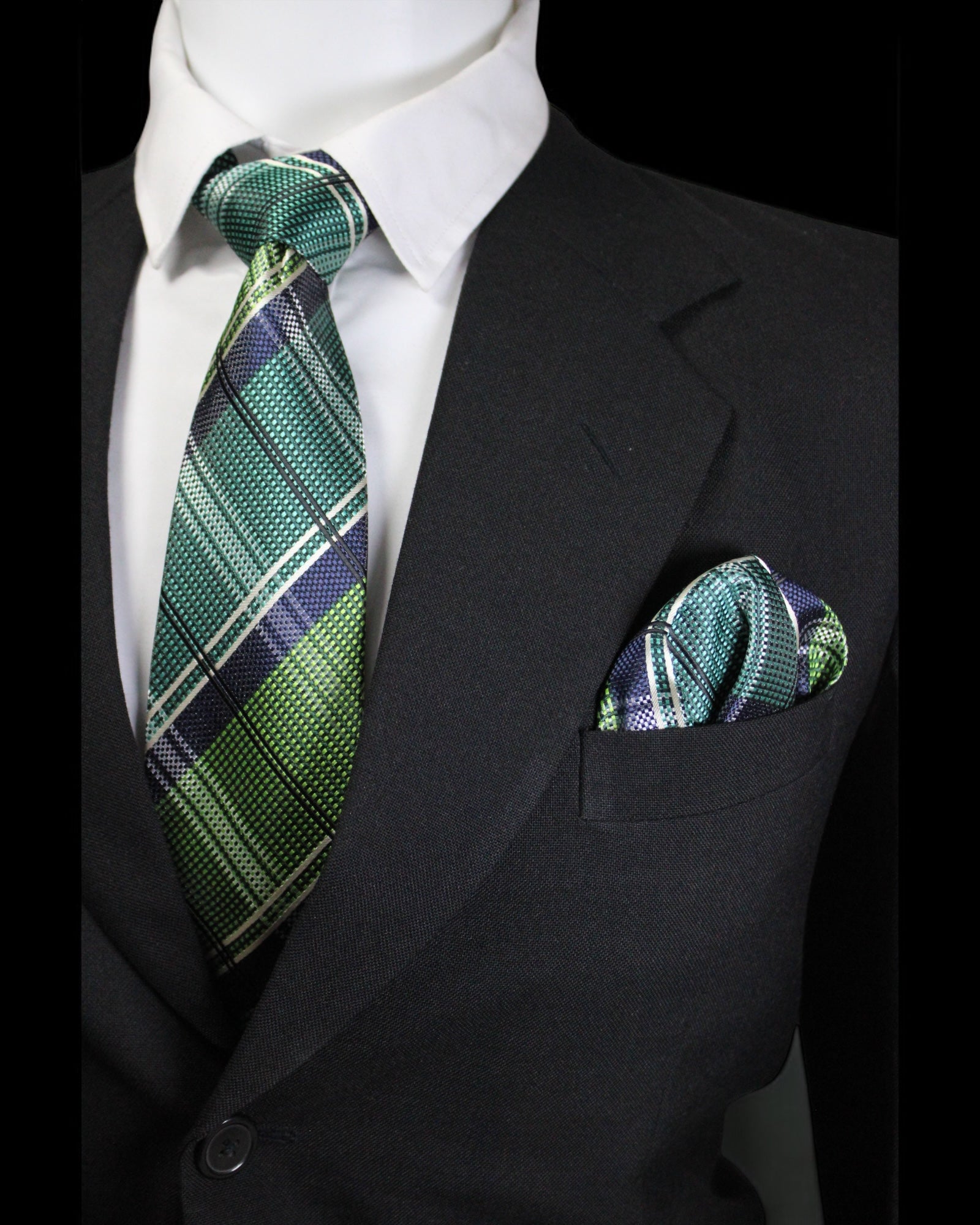 Green plaid tie and pocket square on a black suit jacket Tie Benon