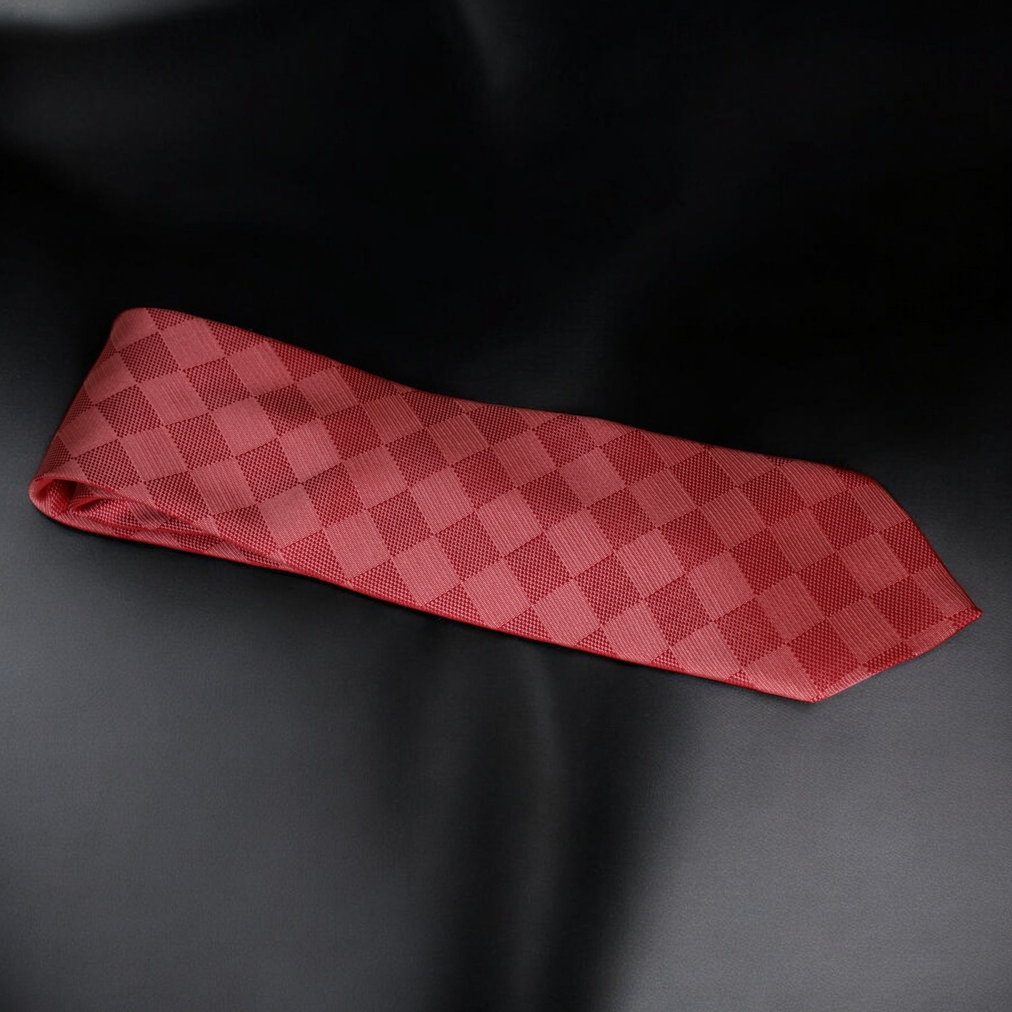 Red checkered tie on a black background