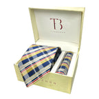 A set of yellow checkered tie and pocket square combo by Tie Benon, displayed in an open white box with gold interior. The tie is visible at the top, and the pocket square is placed beside it.