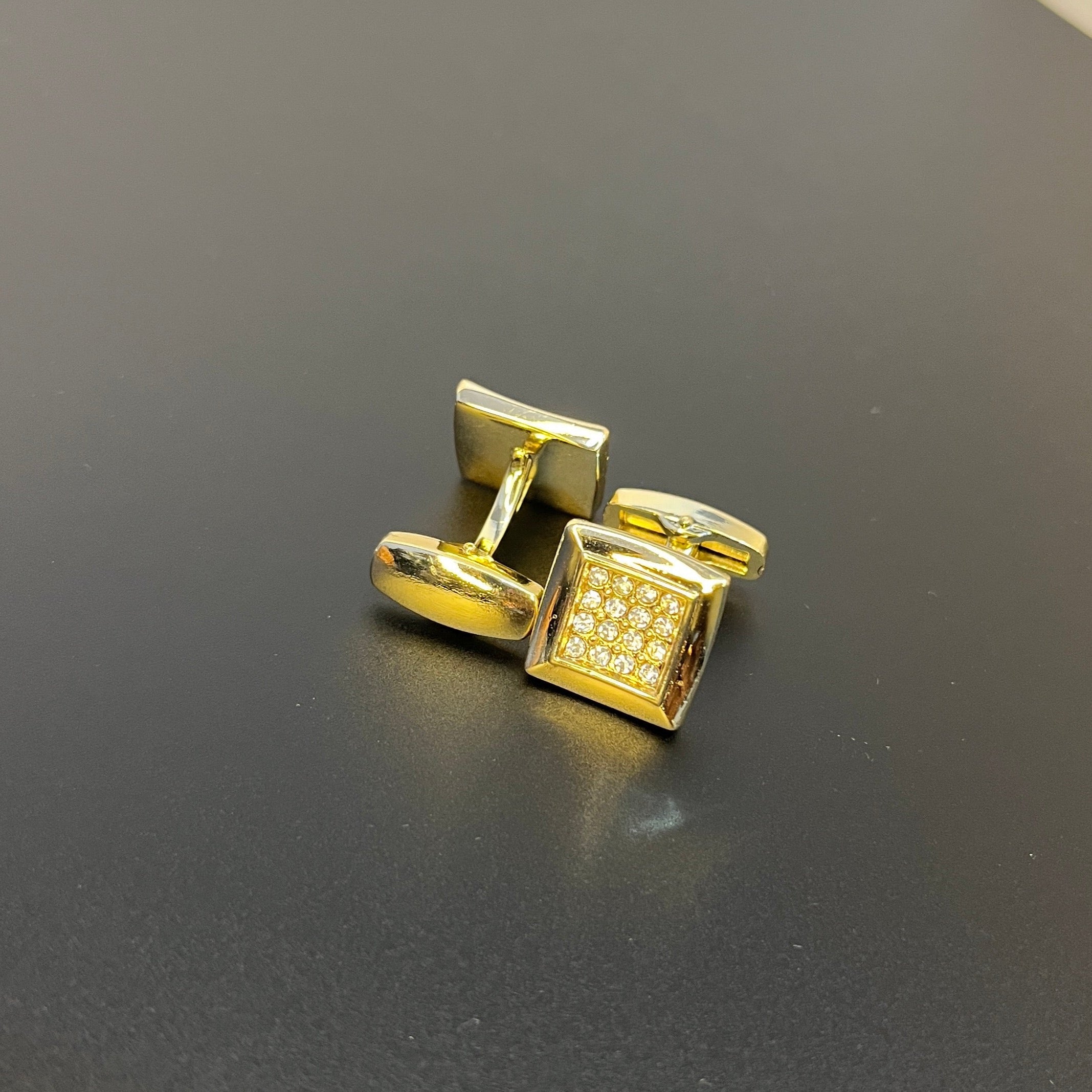Golden square studded