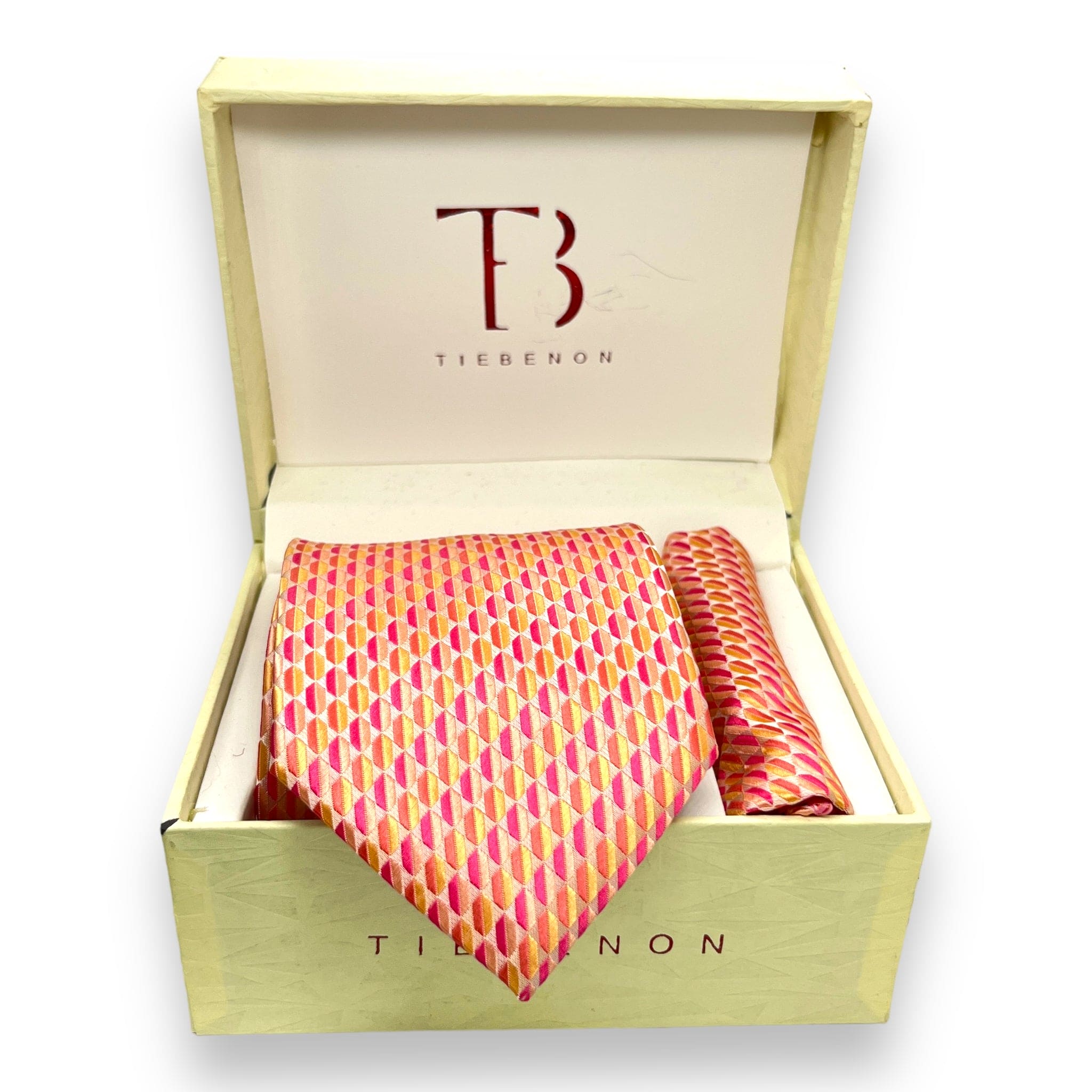 A pair of peach-colored microsilk ties with a geometric pattern, presented in an open wooden box with the brand name 'Tie Benon' on the interior lid.